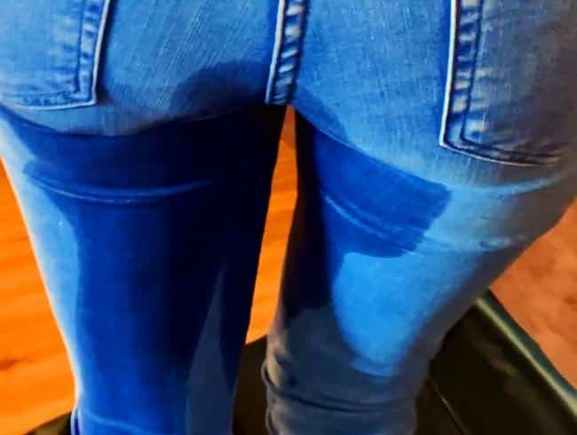 Bitch pisses in her jeans & I piss them all over (SensualPeeCouple)