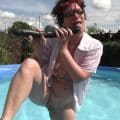 Bitch fucks the pussy in the pool with a dildo @ Popp-Sylvie
